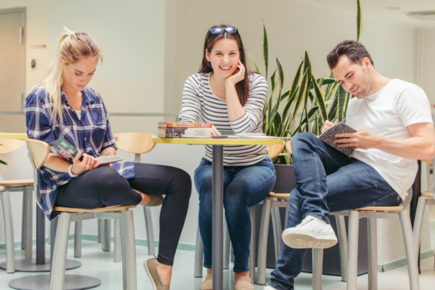 Investment education classroom setting with students learning financial analysis